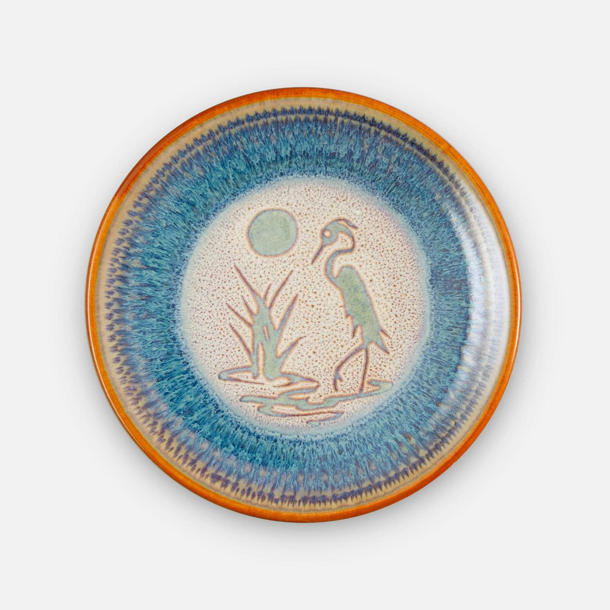 Handmade Pottery Rimless Dessert Plate made by Georgetown Pottery in Maine in Purple Heron pattern